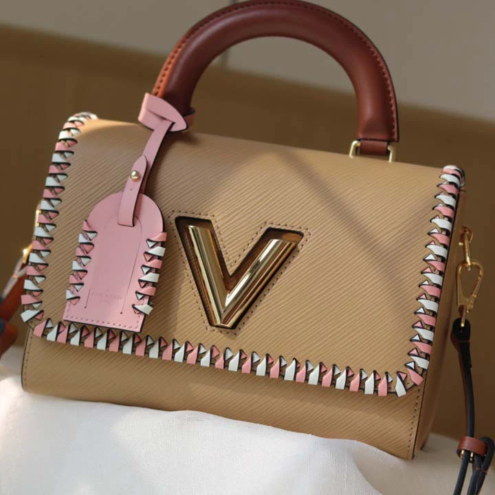 Louis Vuitton Twist MM handbag Black/Pink/Brown 12 M